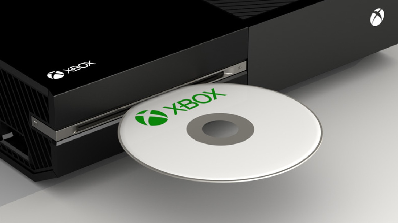Inserting disc into Xbox console