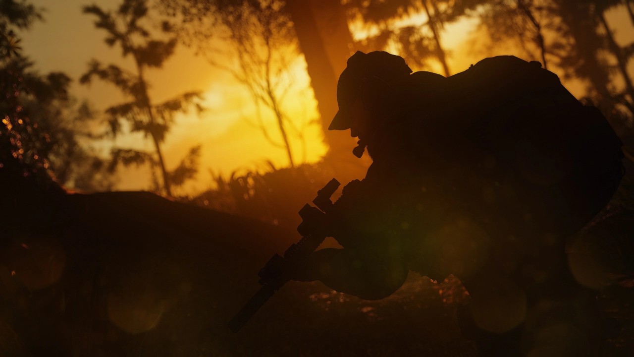 Ghost Recon Project Over Nomad stealthily crouching at sunset