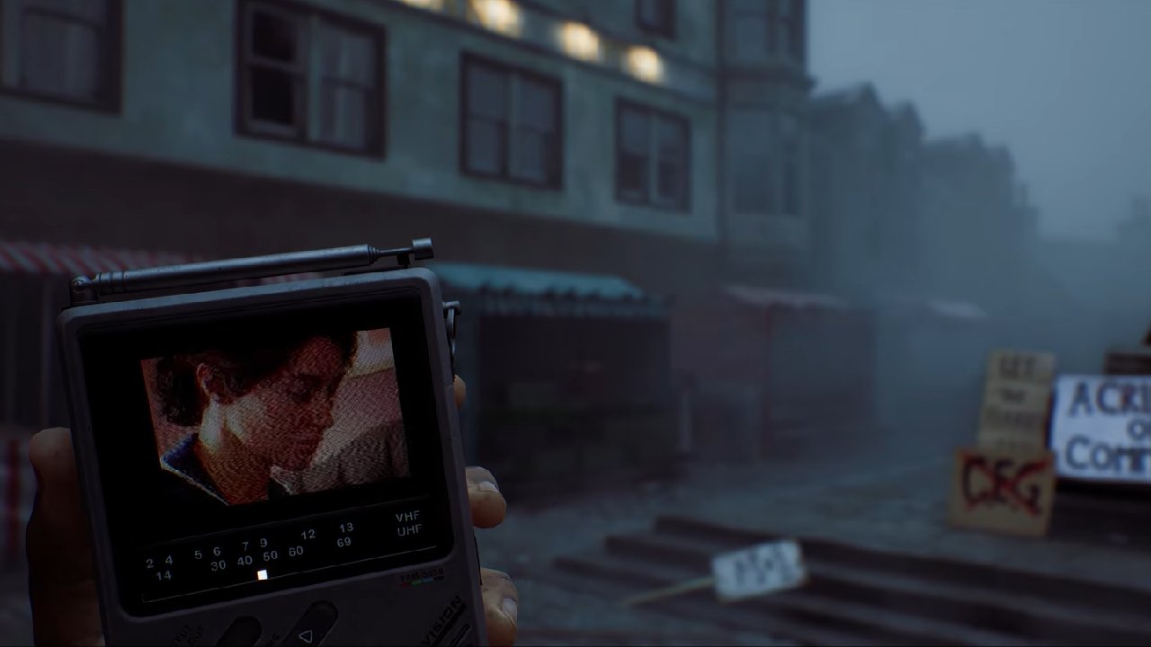Silent Hill Townfall player holds handheld CRTV