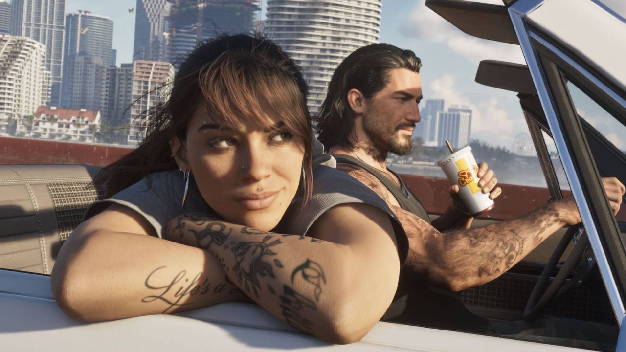 Grand Theft Auto VI Lucia and Jason driving and holding cup from Cluckin' Bell