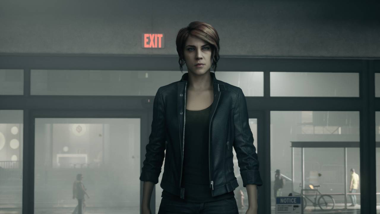 Control Jesse Faden standing near building entrance