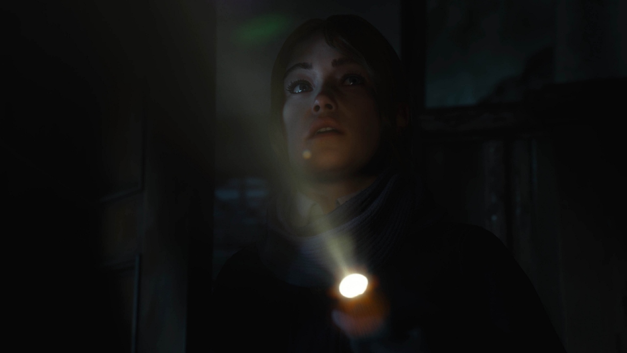 Until Dawn Sam holds a flashlight