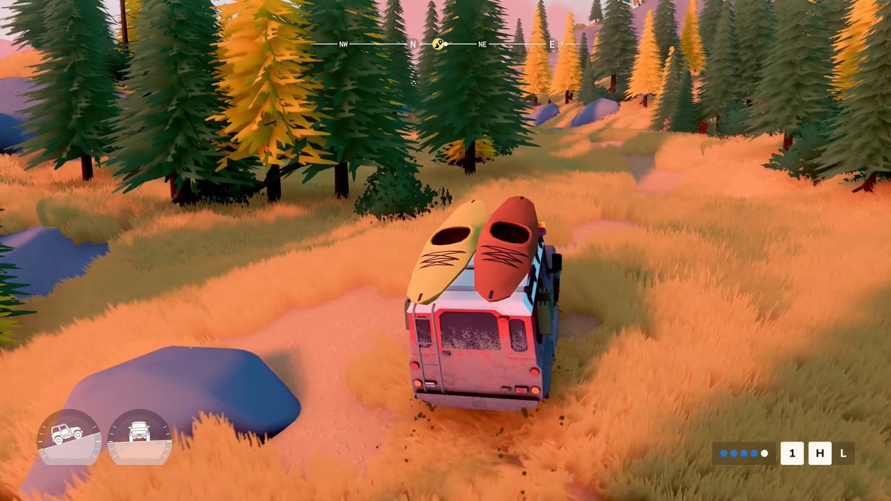 over the hill car drives through forest
