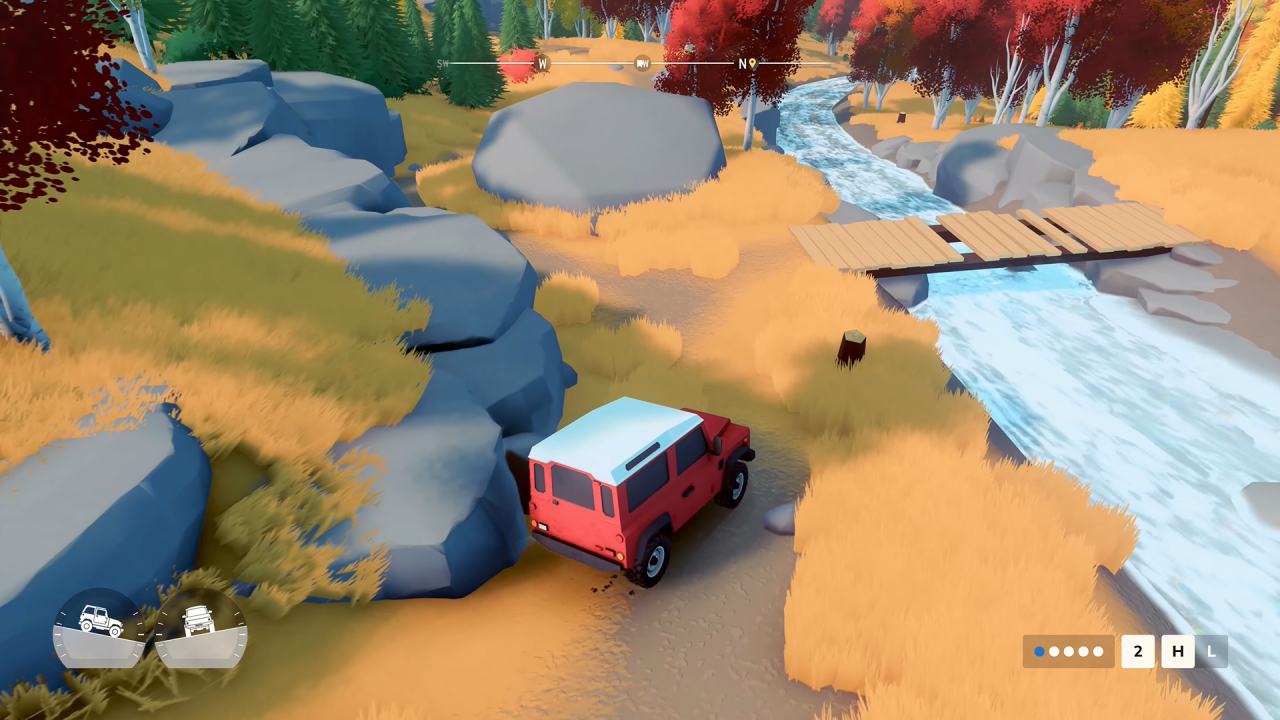 over the hill car navigates rocky path